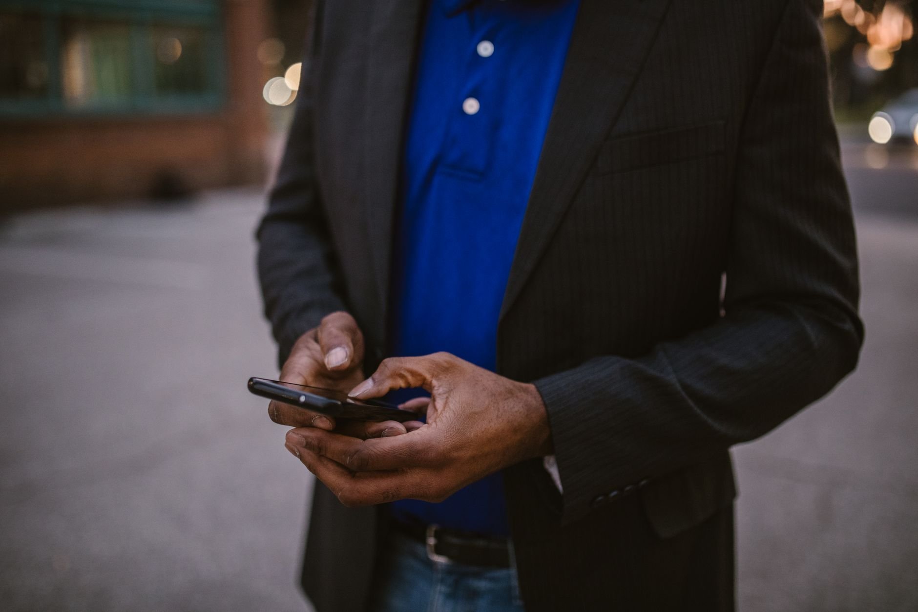 A local South African business owner managing their business on a smartphone